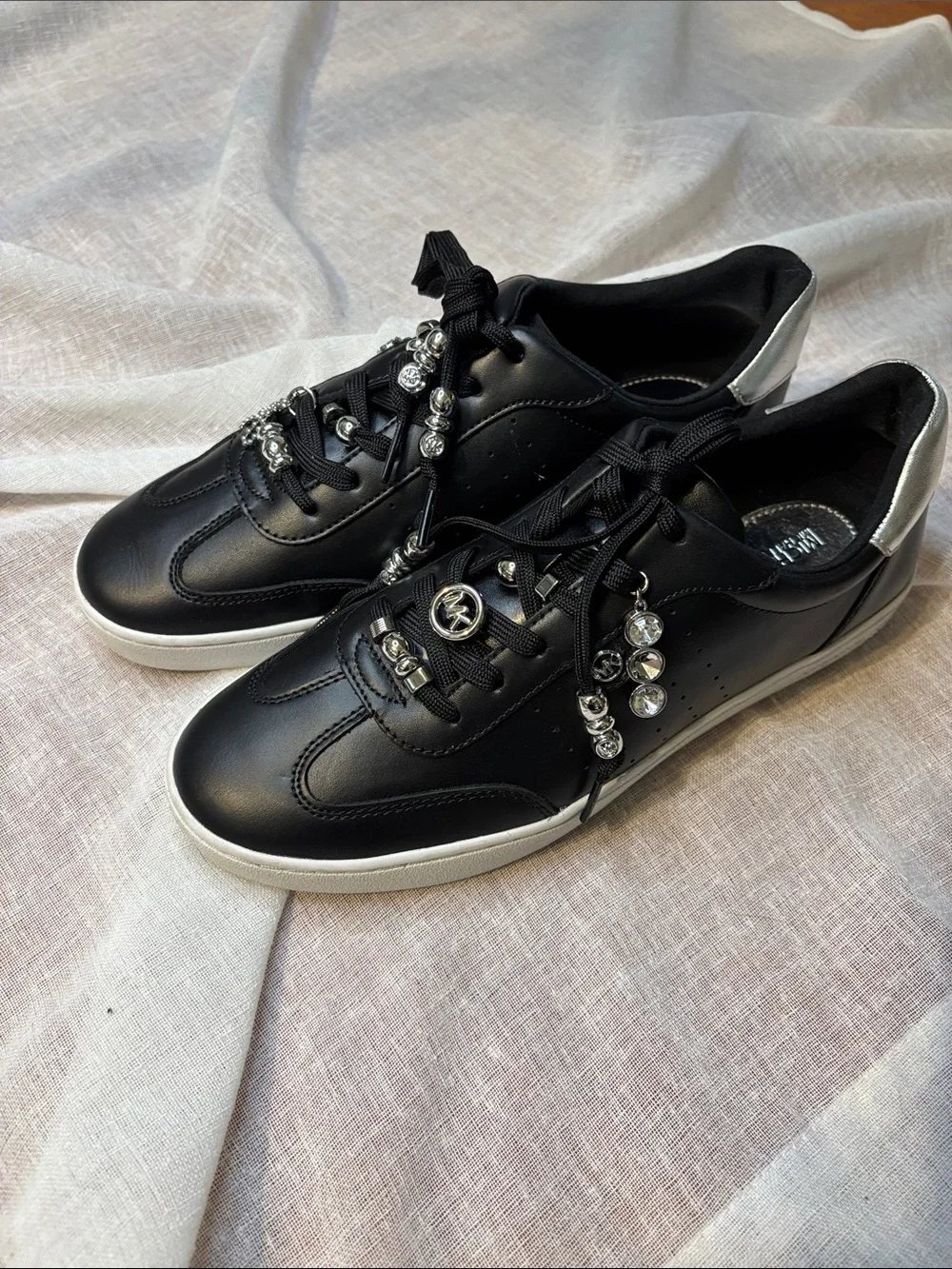Michael Kors Black Leather Sneakers with Silver Charms